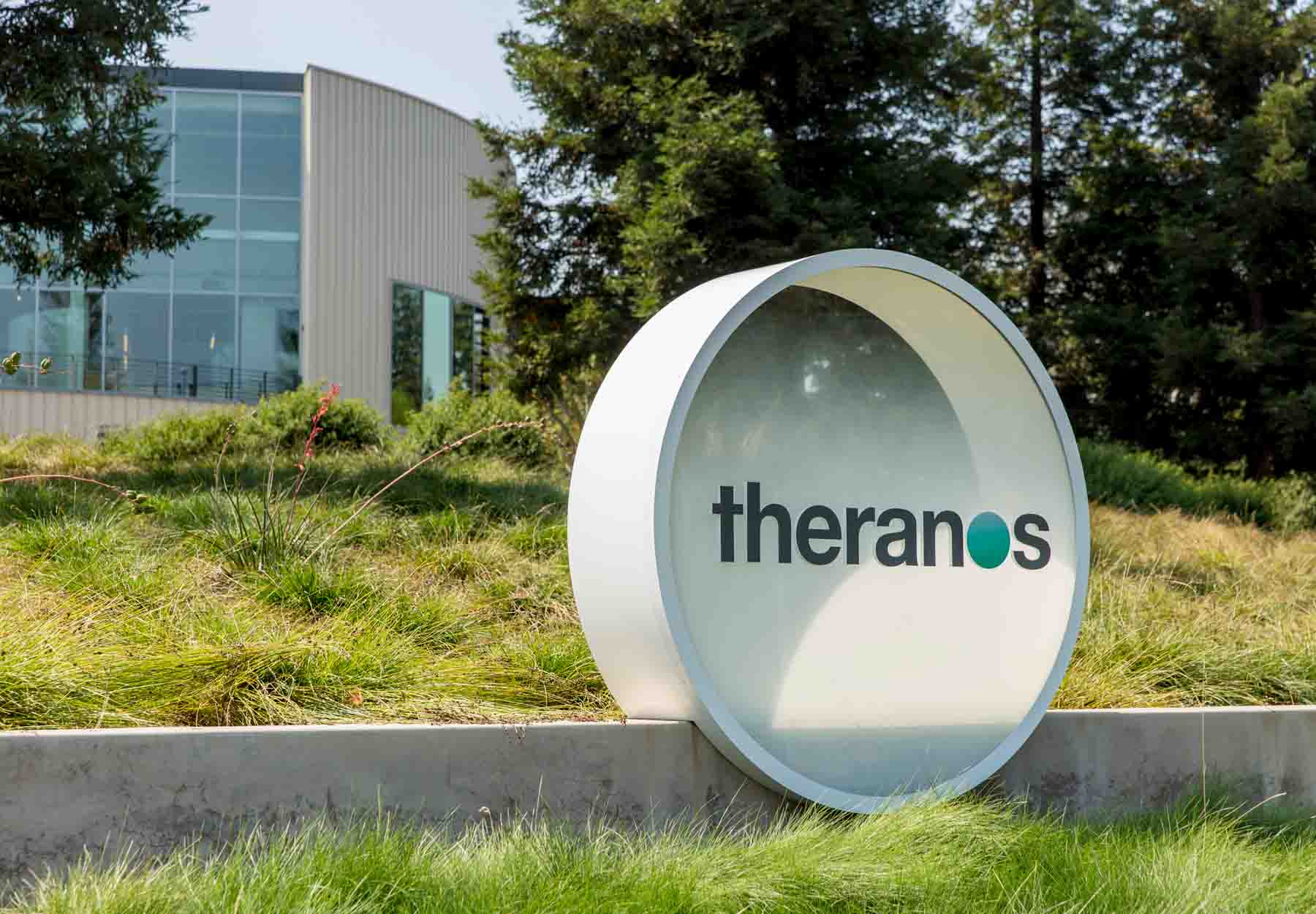 The Theranos sign in front of the company's building