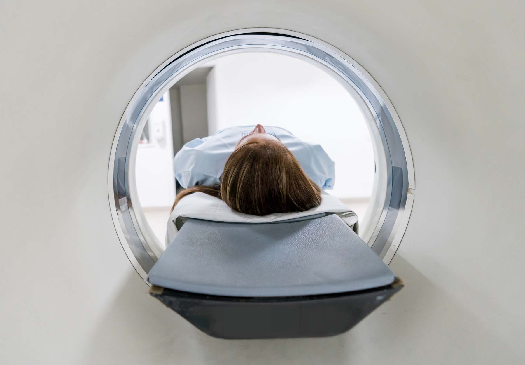 A woman in an MRI machine.