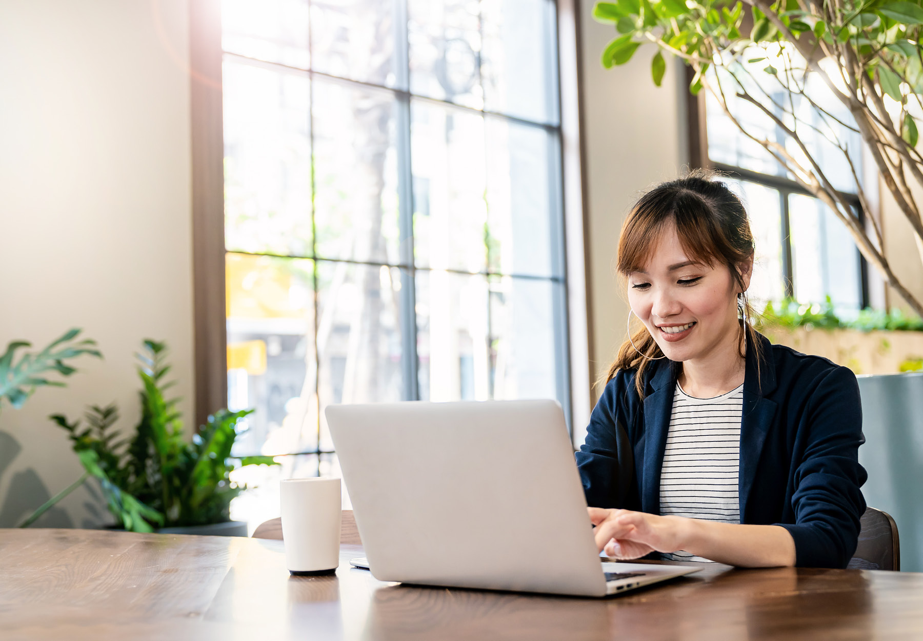 A woman ordering something online on her latop.