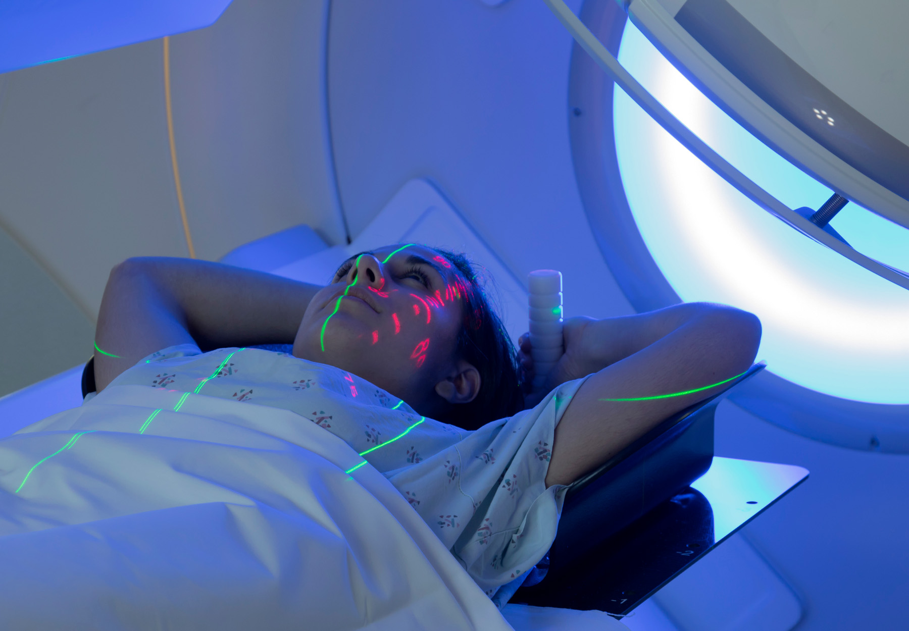 Woman receiving Radiation Therapy Treatments for Cancer stock photo