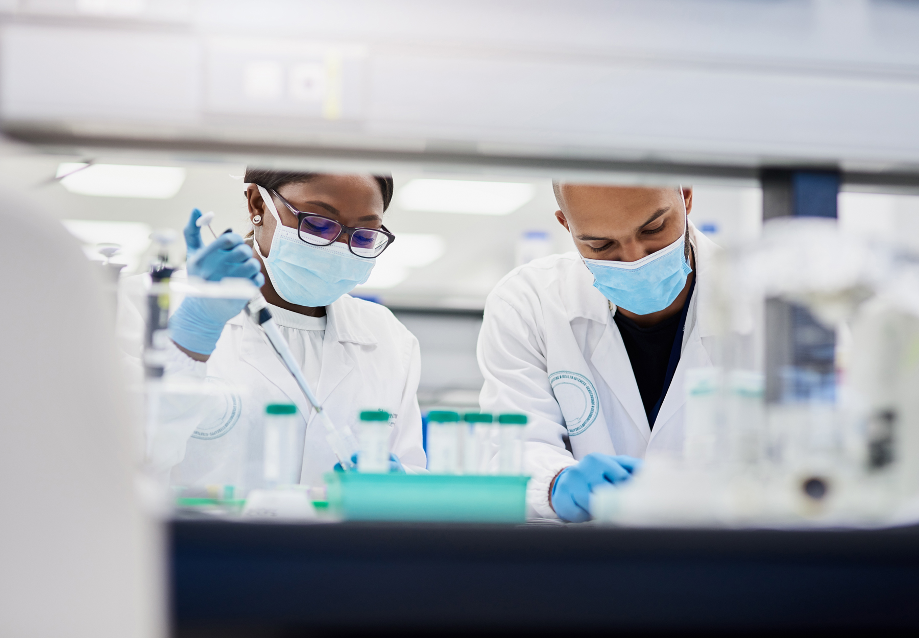 Shot of two young scientists working in a medical laboratory