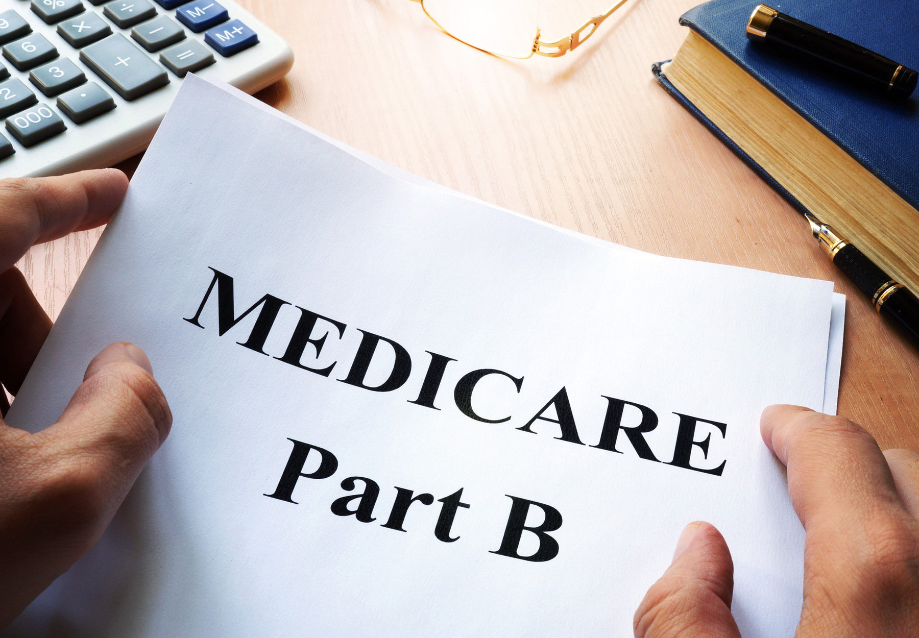 Medicare Part B document on a desk