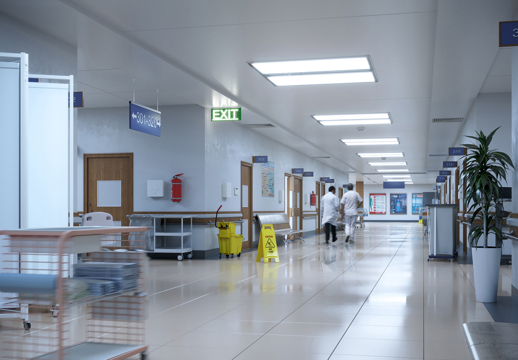 Stock image of a hospital hallway with two staff members in the distance