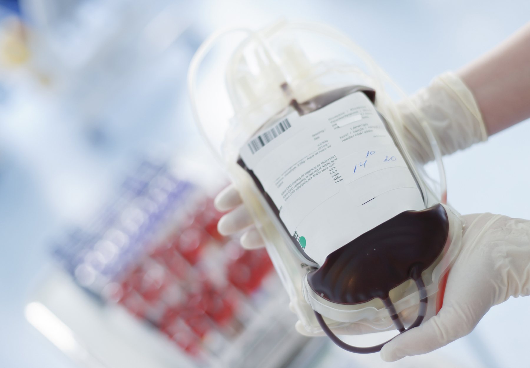 Stock photo of nurse holding blood transfusion bag