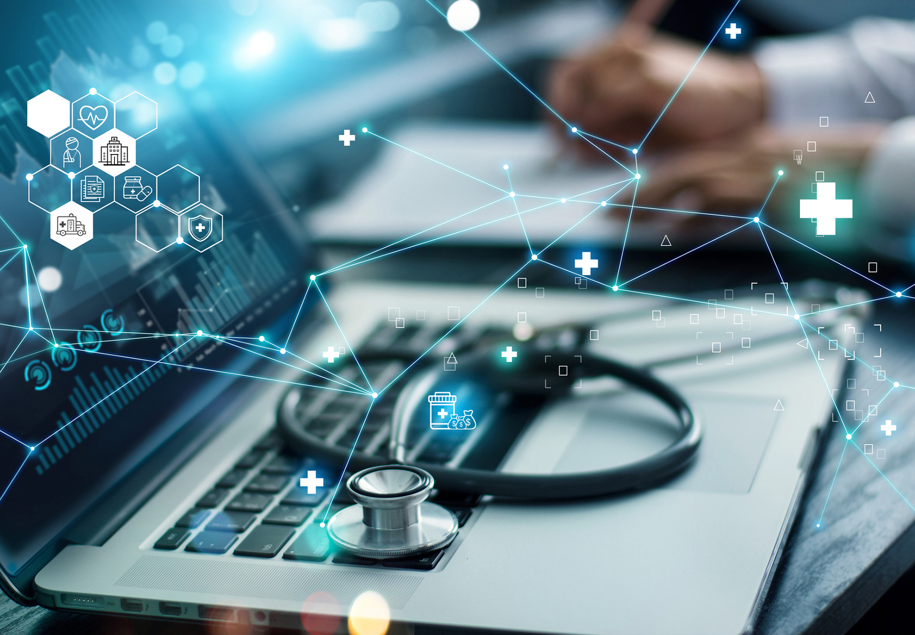 Stock image of laptop with data illustration coming out of it. There is a stethoscope on the laptop to symbolize health care data.