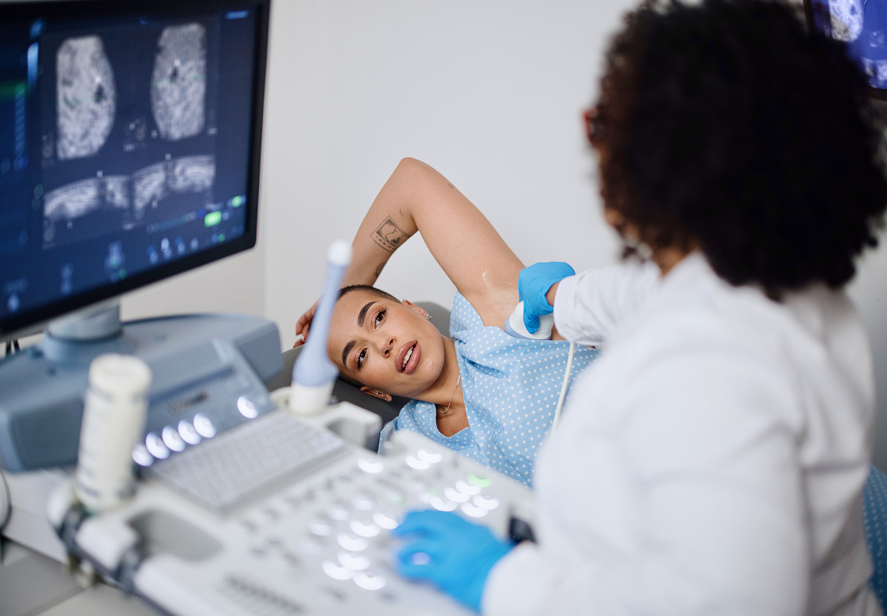 Woman having breast ultrasound. iStock image.
