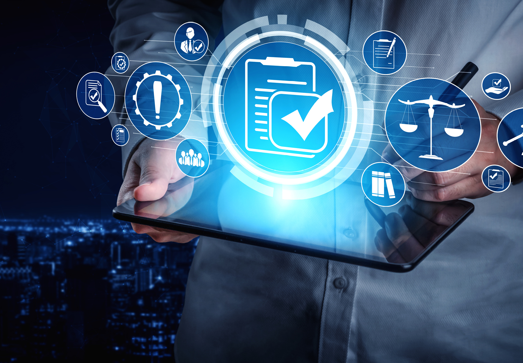 Lab professional in white lab coat is holding a tablet with compliance and legal related graphics coming out. Lab compliance concept. iStock image.