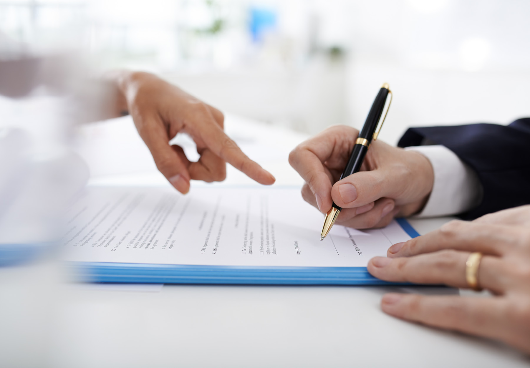 Signing business contract iStock Image