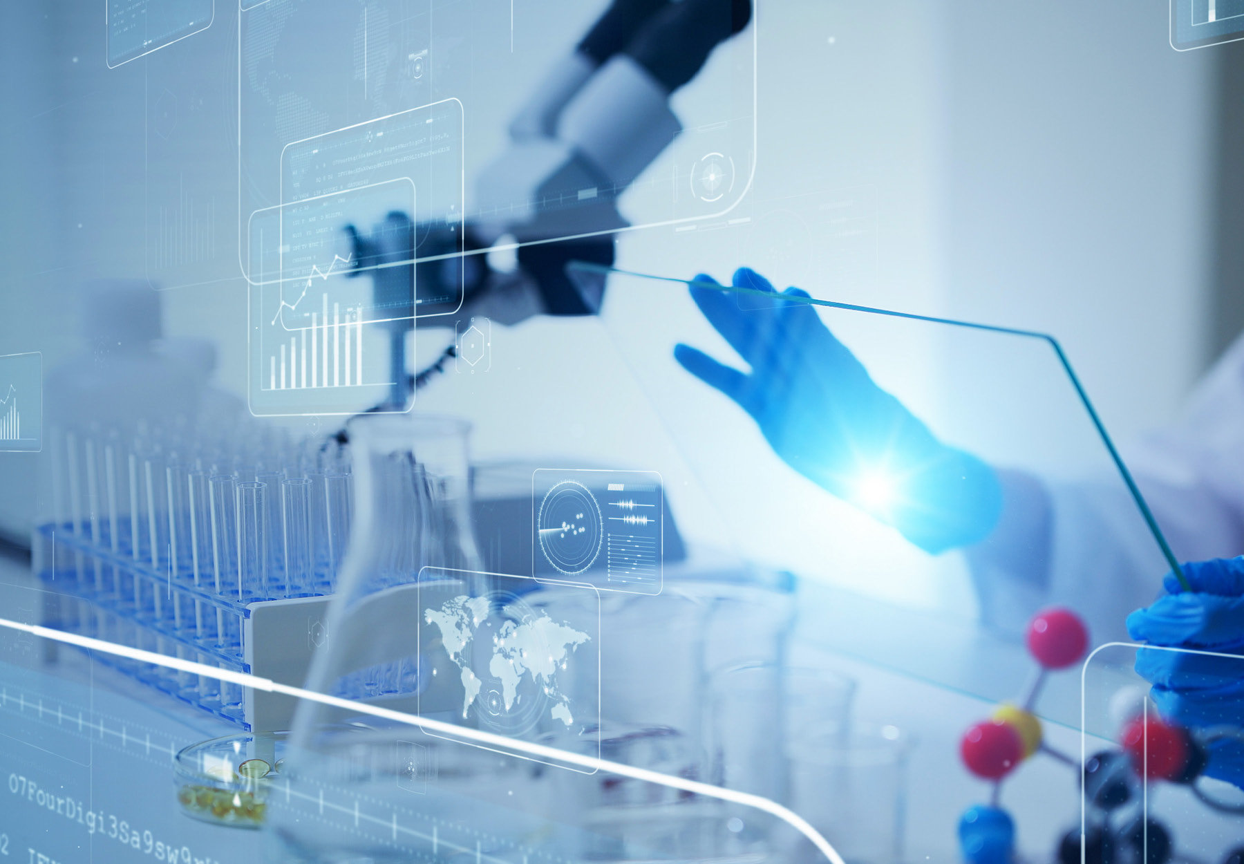 Science technology concept image. Scientist at bench with microscope and other laboratory equipment. Stock image.