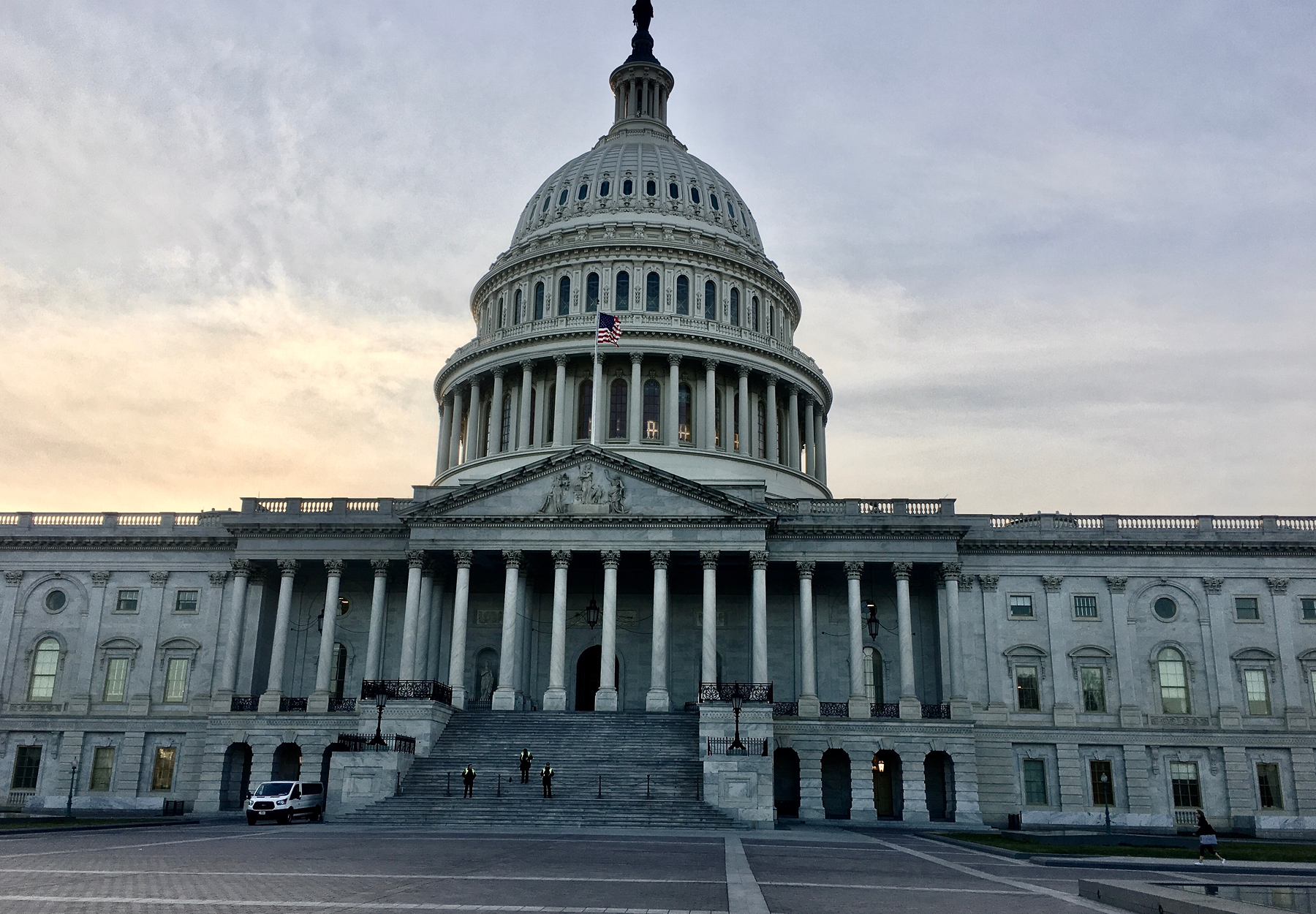 Image of US Capitol Building in shadow. Stock image.