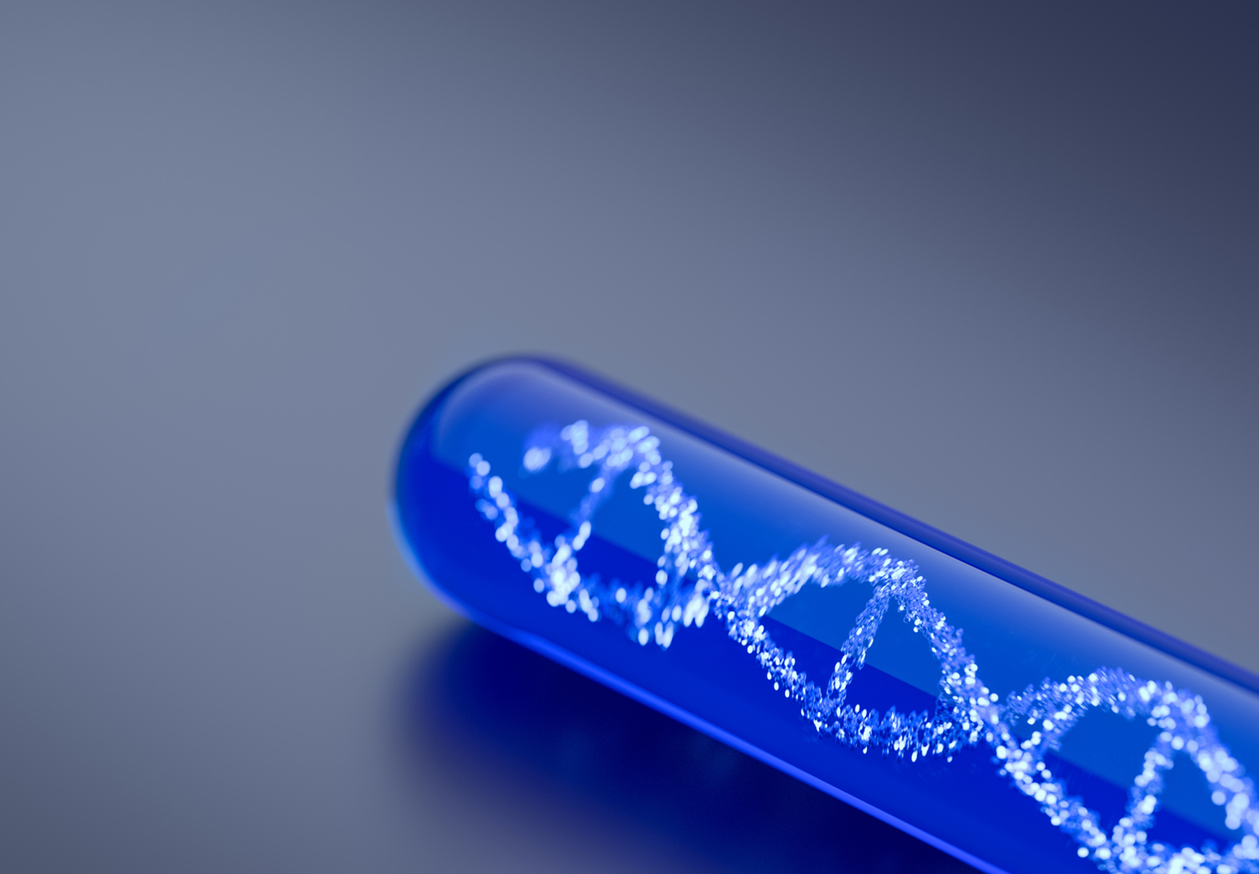 Photo illustration of blue test tube with DNA strand inside. Genetic testing concept. Stock image.