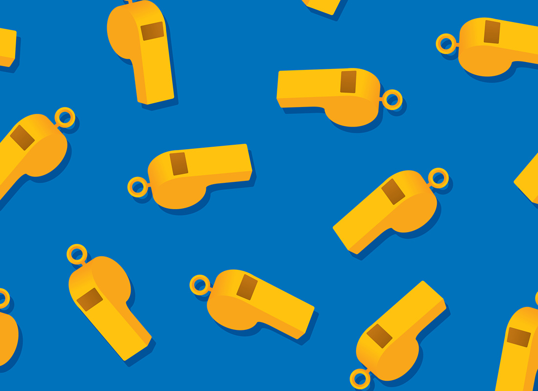 Pattern of yellow whistles on a blue background. Whistleblower concept.